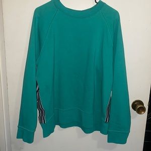 Woman’s green sweatshirt